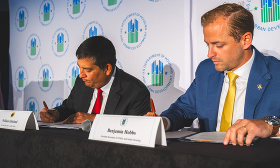 Billy Kirkland, DOI Assistant Secretary for Indian Affairs and Ben Hobbs, HUD Assistant Secretary for Public and Indian Housing sign the Tribal Trust Land Homeownership Act MOU Billy Kirkland, DOI Assistant Secretary for Indian Affairs and Ben Hobbs, HUD Assistant Secretary for Public and Indian Housing sign the Tribal Trust Land Homeownership Act MOU
