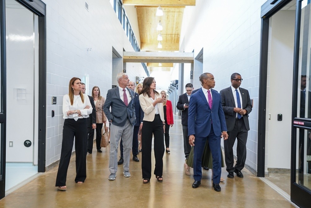 The visit continued with a driving tour of Opportunity Zone projects in Downtown Springdale, followed by a working lunch with Governor Sanders to discuss the impacts of Opportunity Zone redevelopment. Established under the 2017 Tax Cuts and Jobs Act, Opportunity Zones incentivize investment and development in traditionally underserved areas, including four designated areas in Springdale The visit continued with a driving tour of Opportunity Zone projects in Downtown Springdale, followed by a working lunch with Governor Sanders to discuss the impacts of Opportunity Zone redevelopment. Established under the 2017 Tax Cuts and Jobs Act, Opportunity Zones incentivize investment and development in traditionally underserved areas, including four designated areas in Springdale